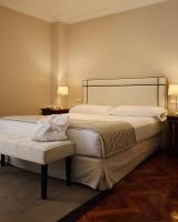 A bed or beds in a room at Don Pio