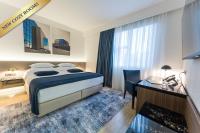 Posteľ alebo postele v izbe v ubytovaní Hotel Jarun