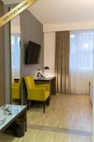 Televízia a/alebo spoločenská miestnosť v ubytovaní Hotel Jarun