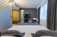 Posteľ alebo postele v izbe v ubytovaní Hotel Jarun