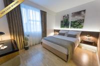 Posteľ alebo postele v izbe v ubytovaní Hotel Jarun