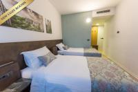 Posteľ alebo postele v izbe v ubytovaní Hotel Jarun
