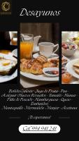 a flyer for a breakfast table with a plate of breakfast foods at D'Cardenas Hotel in Cajamarca