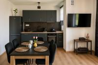 Kuchyňa alebo kuchynka v ubytovaní Apartamenty u Moni