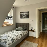 Posteľ alebo postele v izbe v ubytovaní Apartamenty u Moni