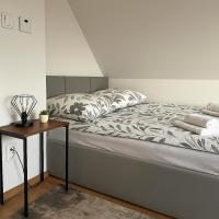 Posteľ alebo postele v izbe v ubytovaní Apartamenty u Moni