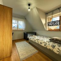 Posteľ alebo postele v izbe v ubytovaní Apartamenty u Moni