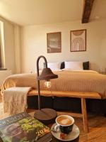 Een bed of bedden in een kamer bij De Pingerhoeve