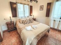 A bed or beds in a room at El Vergel de Berchules