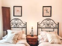 A bed or beds in a room at El Vergel de Berchules