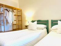 Posteľ alebo postele v izbe v ubytovaní Villa Lavinia B&B