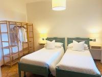 Posteľ alebo postele v izbe v ubytovaní Villa Lavinia B&B
