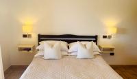 Posteľ alebo postele v izbe v ubytovaní Villa Lavinia B&B