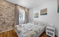 Posteľ alebo postele v izbe v ubytovaní Holiday Home Murter 18 With Seaview