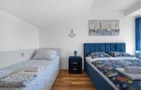 Posteľ alebo postele v izbe v ubytovaní Holiday Home Murter 18 With Seaview