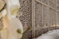 A bed or beds in a room at Hotel La Casa de Los Mosaicos