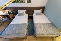 Posteľ alebo postele v izbe v ubytovaní Hotel Jarun
