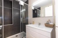 Koupelna v ubytování UHC Novelty Apartments