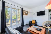 Televízia a/alebo spoločenská miestnosť v ubytovaní Appartement La Baule Pornichet Terrasse - Cuisine - Calme - Wifi - Parking Gratuit