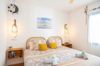 Postel nebo postele na pokoji v ubytování Tarifa Cozy House - Beach & Parking