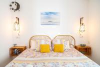 Postel nebo postele na pokoji v ubytování Tarifa Cozy House - Beach & Parking