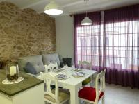 A seating area at Los tres castells