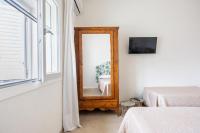 A bed or beds in a room at La Casa di Zia Dedera