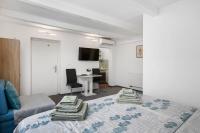 TV a/nebo společenská místnost v ubytování Apartments Stars