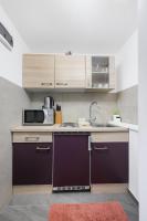 Kuchyň nebo kuchyňský kout v ubytování Apartments Stars