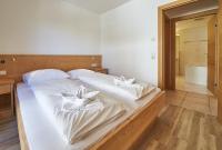 Łóżko lub łóżka w pokoju w obiekcie Life & Luxury Appartements