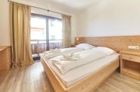 Łóżko lub łóżka w pokoju w obiekcie Life & Luxury Appartements