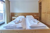 Łóżko lub łóżka w pokoju w obiekcie Life & Luxury Appartements
