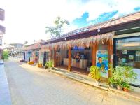 a store on the side of a street at Suites by Eco Hotels in El Nido