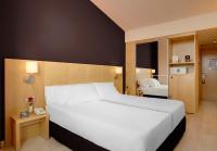 Posteľ alebo postele v izbe v ubytovaní Hotel Sercotel Portales