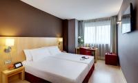 Posteľ alebo postele v izbe v ubytovaní Hotel Sercotel Portales
