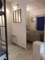 Łóżko lub łóżka w pokoju w obiekcie Maison coquette en Camargue