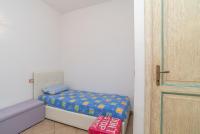 Łóżko lub łóżka w pokoju w obiekcie Sardegnaot vista mare piscina e spa