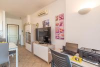 Telewizja i/lub zestaw kina domowego w obiekcie Sardegnaot vista mare piscina e spa
