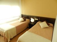 Posteľ alebo postele v izbe v ubytovaní Hotel Travessera
