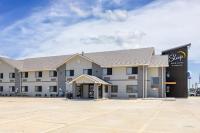 an empty parking lot in front of a hotel at Sleep Inn &amp; Suites Salina I-135 in Salina