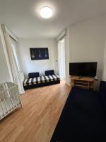 TV a/nebo společenská místnost v ubytování Apartmány pod horizontem