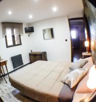 Posteľ alebo postele v izbe v ubytovaní Green Peaks B&B Country House Alojamiento Rural
