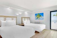 Ein Bett oder Betten in einem Zimmer der Unterkunft Best Western Plus Beach Resort