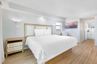 Ein Bett oder Betten in einem Zimmer der Unterkunft Best Western Plus Beach Resort