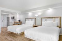 Ein Bett oder Betten in einem Zimmer der Unterkunft Best Western Plus Beach Resort