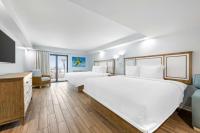 Ein Bett oder Betten in einem Zimmer der Unterkunft Best Western Plus Beach Resort