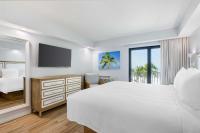 Ein Bett oder Betten in einem Zimmer der Unterkunft Best Western Plus Beach Resort