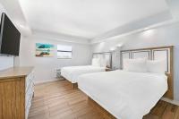 Ein Bett oder Betten in einem Zimmer der Unterkunft Best Western Plus Beach Resort
