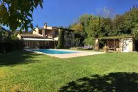 a house with a swimming pool in a yard at Villa Saint Paul in Saint Paul de Vence