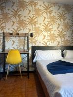 A bed or beds in a room at Hostal Baleàric